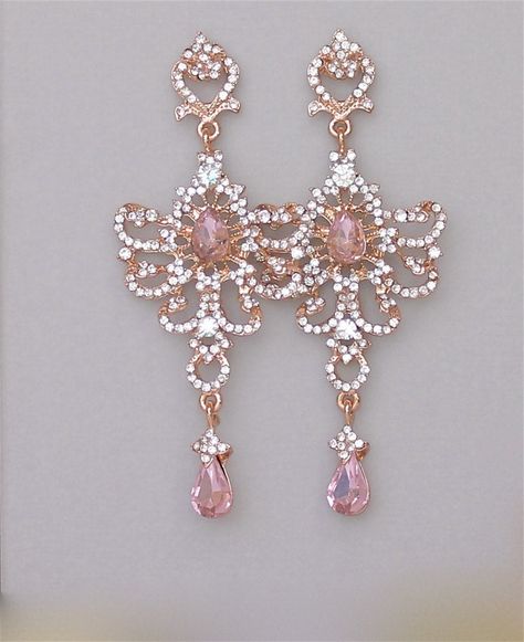 "Stunning blush chandelier earrings designed to add the Wow! factor. Vintage inspired long soft rose gold earrings, are studded with Swarovski clear crystals and sparkling pink blush teardrops. These are light and comfortable earrings, and we are happy to supply a pair of 'comfort back' silicone post pads with your purchase if requested, which help support long earrings. (please leave message at checkout) Measurements: Length: 3.5\" (9 cm) Width -1.5\" (3.8 cm) Nickel free earpost. Set in tarnis Rose Gold Bridal Earrings, Pink Crystal Earrings, Crystal Statement Earrings, Gold Bridal Earrings, Magical Jewelry, Pink Bridal, Classy Jewelry, Fancy Jewellery, Pink Jewelry