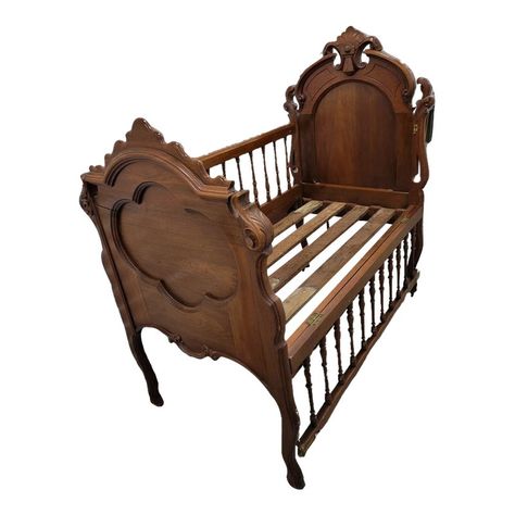 19th century American Victorian Renaissance Revival walnut crib and youth bed with sides that  fold down to convert to a child's bed. Bed still has original brass castors.  Plastic coated mattress that was with the bed is in some of the photos.  Mattress is not included for sale. The dimensions of that mattress was 49.5" x 25.75".  The bed can be easily dissembled for easy storage.  Measures: 53.25" long, 31.5" wide, Headboard 56" high, footboard 49.5"  G 3252 Gothic Crib, Goblin Decor, Victorian Crib, Antique Baby Bed, Victorian Kids Room, Walnut Crib, Antique Baby Cribs, Vintage Baby Cribs, Wide Headboard