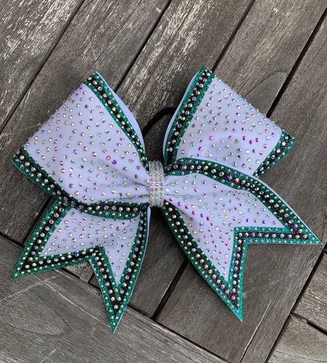 "Team orders of 15 or more bows can take longer to ship.  please read my shop announcement for updated shipping times. made on 3\" grasgrain ribbon and spandex. all of my bows measure approximately 7\"x7\". i only use large, metal free nylon elastices that do not snap-ever! all of my bows are finished with a custom made rhinestone center. -packaged and shipped in a box to ensure it arrives in perfect condition. team orders ship free, if you would like to place a team order just message me and i All Star Cheer Bows, Cheer Bow Ideas, Cheer Base, Cheerleader Girls, Black Cheerleaders, Competition Bows, Cheer Banquet, Dance Bows, Cheerleading Bow