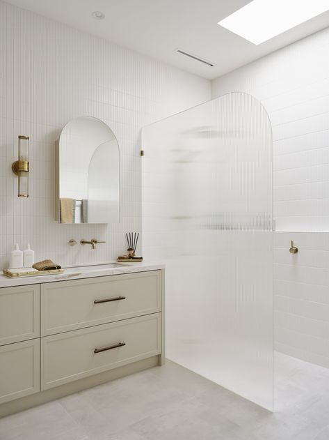 Luxury modern provincial bathroom, beige joinery, arched mirror cabinet & fluted shower screen Arch Mirror Cabinet, Arched Shower Screen, Arch Shower Screen, Bathroom Vanity Beige, Bathroom 2024 Design Trends, Beige Bathroom Cabinets, Fluted Glass Shower Screen, Bathroom Shower Screen, Provincial Bathroom