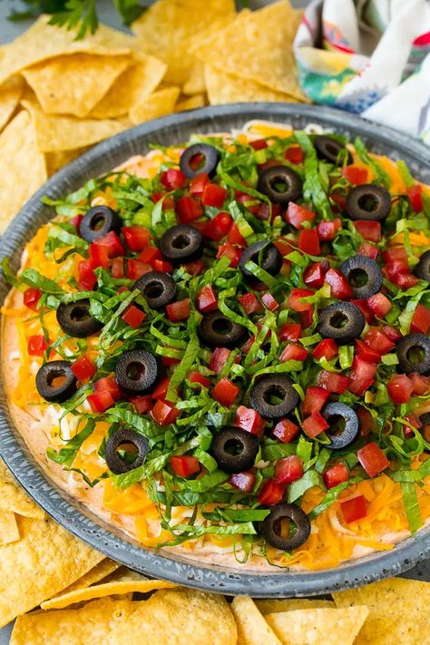 Taco Dip Recipe | Mexican Dip #tacos #dip #appetizer #mexicanfood #cheese #dinneratthezoo Taco Dip Easy, Mexican Food Recipes Appetizers, Mini Quiche Recipes, Mexican Dip, Taco Dip Recipe, Party Snacks Easy, Mexican Appetizers, Festive Appetizers, Taco Dip