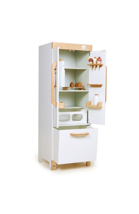 Your tiny chef will have a blast cooking up masterpieces in this deluxe play refrigerator made from smooth rubber wood packed with fun surprises. This fridge comes stocked with wooden eggs, ice cream cones, a milk bottle and a functional, button-operated ice cube dispenser. Ages 3 and up 14.17" x 13.39" x 39.76" 34.67 lb. Assembly required Includes fridge, ice cubes, three ice cream cones, three eggs with stand, one milk bottle and two magnets Rubber wood Spot clean Imported White Fridge, Bottle Of Milk, White Fridges, Grand Kitchen, Egg Stand, Aesthetic Baby, Play Kitchens, Baby Goods, Kitchen Fridges