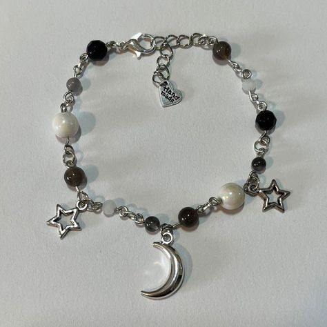 ☆ Ig & Depop: Seek uNeek ☆ handmade ☆ materials: alloy metal, plastic, artificial crystal ☆ freebies every order ☆ more info on store post #moon #stars #beaded #bracelet #handmade #smallbusiness #beadedbracelet #luna Moon Bracelet Aesthetic, Bracelet Ideas Metal, Moon Charm Bracelet, Star Beads Bracelet, Metal Beaded Bracelets, Moon Bead Bracelet, Moon Beaded Bracelet, Small Beads Bracelet, Moon And Star Bracelet