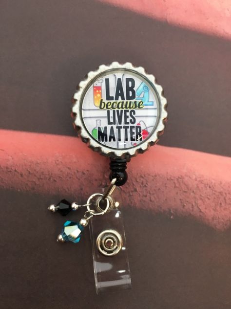 Laboratory Professionals Week is April 24-30!  Here's a badge reel for those who make a difference behind the scenes.  Belt clip back and matching glass beads.   Great gift for coworkers or as a treat-yourself gift! Mobile Phlebotomy, Professional Gift Ideas, Lab Humor, Tech Outfit, Med Lab, Lab Science, Microscopic Photography, Lab Week, Gift For Coworkers