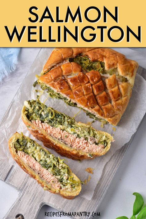 Tasty Salmon Wellington is surprisingly simple to make in under 30 minutes. This recipe uses pre-made puff pastry to wrap up delicious salmon fillets that are topped with a flavorful spinach and cheese mixture. Whether you make air fryer salmon wellington, or bake salmon wellington in the oven, it's so easy to have an impressive and elegant restaurant-quality meal that's ready to serve in minutes. Click through to get this awesome salmon wellington recipe!! #airfryer #salmon #salmonwellington Spinach & Cheese Stuffed Salmon Wellington, Phyllo Wrapped Salmon, Individual Salmon Wellington, Salmon In Puff Pastry Recipes, Salmon Wellington Recipe Puff Pastries, Salmon In Pastry, Gordon Ramsay Salmon, Salmon Puff Pastry, Salmon Mousse Recipes