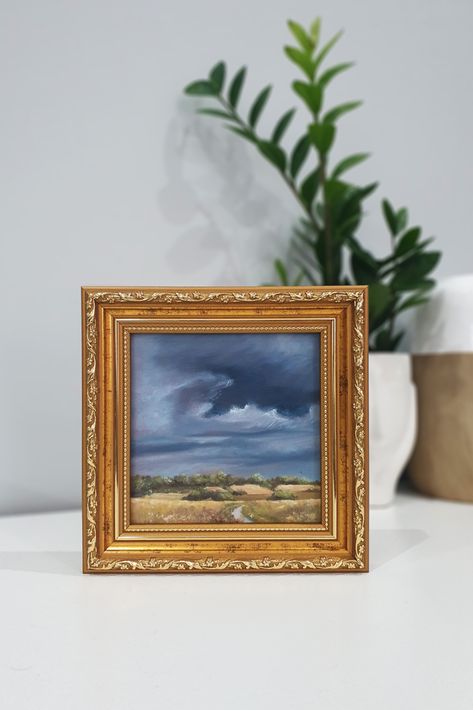 This painting represents spring storm landscape, it is fully hand painted original oil painting, available with the golden frame. It'll give an unique magic touch to your cozy home. 
 Perfect wall decor for living room or bedroom. 

Traditional living room interior design, 
modern interior decor, Modern farmhouse style, home decor, wall art, framed art, oil painting, small painting, special gift, one of a kind, landscape painting, storm sky, nature lover, new home owner, housewarming gift idea Traditional Living Room Interior Design, Living Room Interior Design Modern, Storm Landscape, Framed Wall Art Living Room, Storm Sky, New Home Owner, Bedroom Traditional, Modern Interior Decor, Paper Light