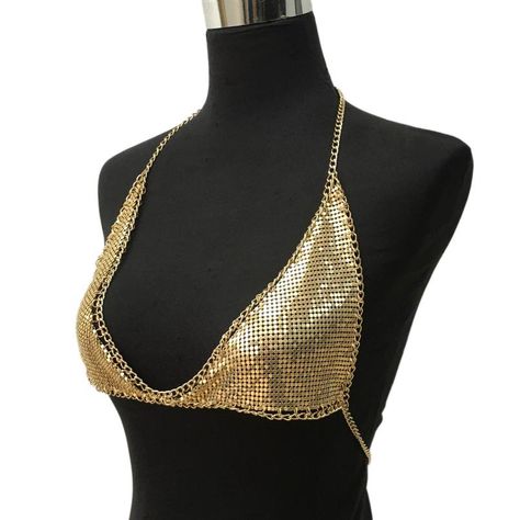 - Material: Gold / Silver plated alloy - Weight: 58 grams Get your festival vibe on or just glam things up a little for the beach with this gorgeous metallic bralette. Coming in at just 58 grams, it won't weight you down at all. With all that extra glimmer and it's definite wow factor, you'll look great and feel great all day long and well into the night as you keep the party going. This metallic bralette is available gold, silver and black. Grunge Outfit, Aesthetic Grunge Outfit, Festival Vibes, Into The Night, Wow Factor, Aesthetic Grunge, Grunge Outfits, Feeling Great, Bralette