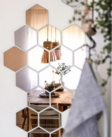 This is less hack and more artful whimsy, but you can really let your creativity fly using the Hönefoss copper hexagon mirrors from Ikea. They make a perfect installation behind a dining room table, in an entryway or maybe even above your bedroom headboard. Hexagon Mirror Wall Decor, Ikea Mirror Hack, Mirror Hack, Hexagon Mirror, Ikea Mirror, Hal Decor, Elegant Mirrors, Best Ikea, Mirror Tiles