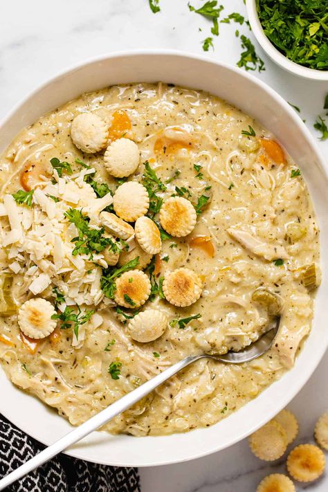 This easy instant pot chicken soup is loaded with fresh veggies, perfectly cooked rice, and tender shredded chicken, all in a super creamy base with just a hint of cheesy Parmesan flavor. Everything cooks together all in one pot which makes it simple to throw together and really amps up the delicious made from scratch taste. Cream Of Chicken Rice, Creamy Chicken And Rice, Rice Soup Recipes, Chicken Rice Soup, Easy Comfort Food, Sauteed Veggies, Soup And Stew, Family Dinner Recipes, Instant Pot Chicken