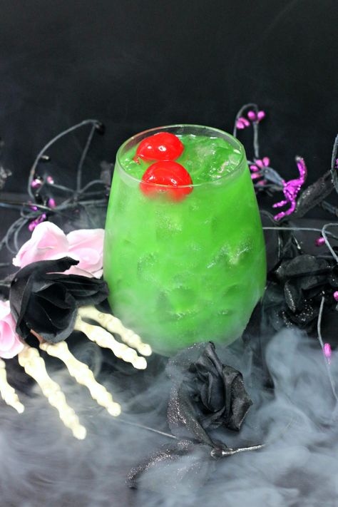 glass filled with green witches brew cocktail Witches Brew Cocktail, Cocktails For Halloween, Midori Cocktails, Cool Cocktails, Midori Melon, Pumpkin Pie Oatmeal, Dip Recipes Appetizers, Ice Cream Drinks, Melon Liqueur