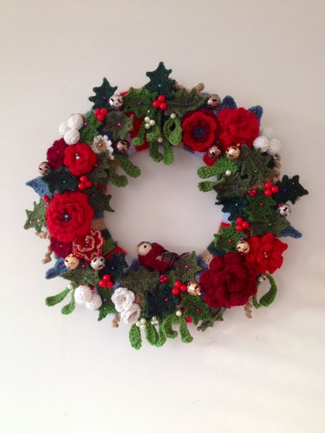 Christmas Crochet wreath made by Emily Ballard and inspired by Lucy of Attic24. Knitted Christmas Wreath, Crocheted Christmas Wreath, Crochet Xmas Wreath, Crochet Wreath Christmas, Crochet Christmas Wreaths, Christmas Crochet Wreath, Crocheted Wreaths, Christmas Wreath Crochet, Crochet Wreaths