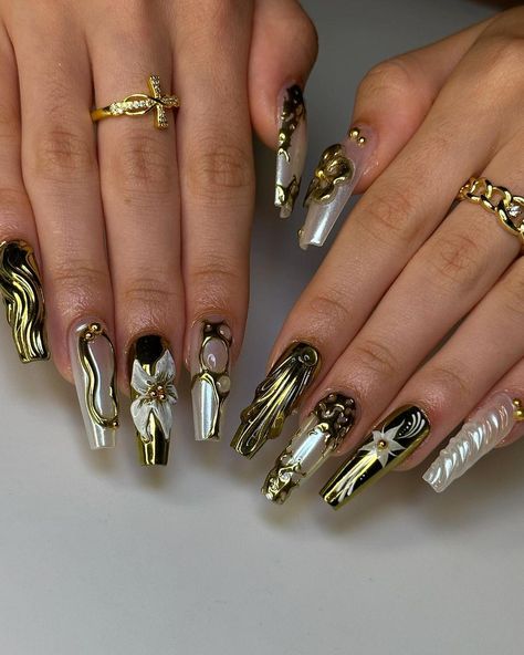 ✨ Luxurious Gold & Pearl Press-On Nails - Unveil Your Inner Glamour! ✨💅 Elevate your style with our stunning Gold & Pearl Press-On Nails, a perfect blend of elegance and luxury. These nails are designed for those who love to make a statement, featuring intricate details that capture the essence of sophistication. 🎨 Artistic Design Elements: 3D Floral Accents: Each nail is adorned with beautiful 3D flowers, adding a unique dimension that draws attention to your hands. Metallic Gold Details: The Birthday Gold Nails, Gold Detailed Nails, Extra Fall Nails, 3d Gold Nails, Black Nails Gold Accent, Gold Junk Nails, Gold Baddie Nails, Square Gold Nails, Long Nail Designs Fall