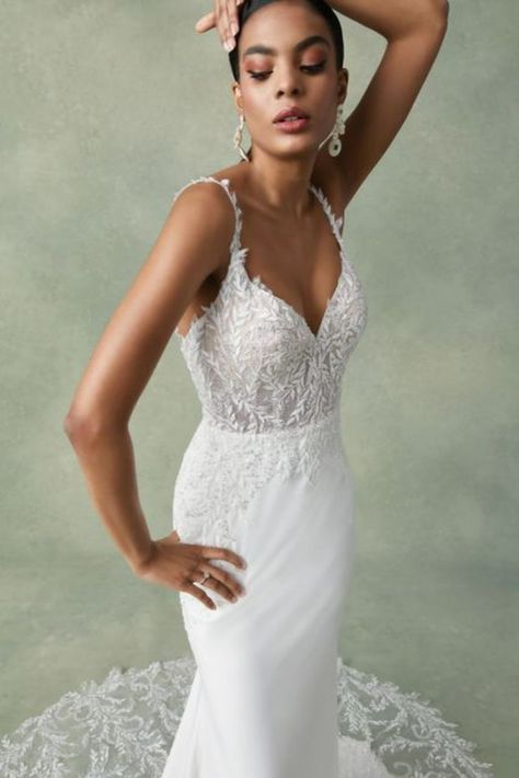 This statement-making wedding dress features a sexy crepe fit and flare silhouette with a tasteful V-neckline that makes way to delicate lace straps. Beaded lace appliqués sparkle as you move and are complemented with a layer of Chantilly lace underneath. The stunning detail of the chapel length train will serve as a wow factor for your walk down the aisle. If preferred, this dress can be ordered with the front bodice lined to the side seams depending on availability. Pretty Wedding Dresses, Fit And Flare Wedding Dress, Justin Alexander, Lace Straps, Chantilly Lace, Wedding Outfits, Pretty Wedding, Lace Gown, Beaded Lace