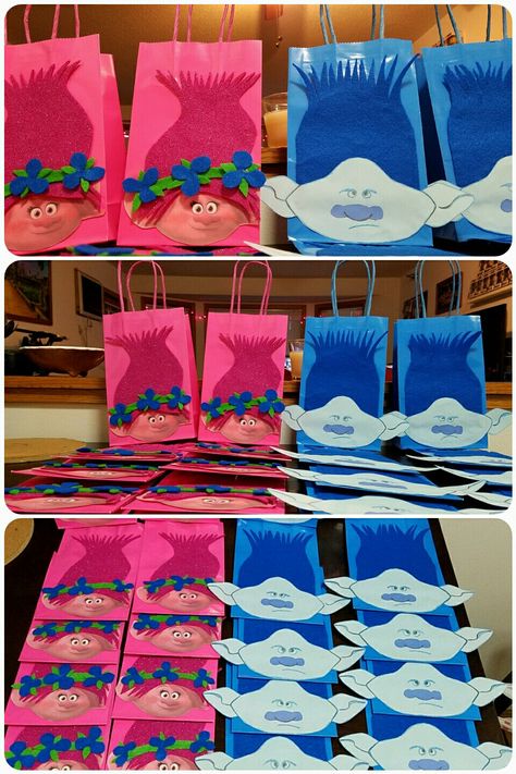 DIY Trolls Poppy & Branch gift party bags.   Learn how to make it: https://youtu.be/iezmSycxSV4  Hair made with felt cloth. Printed Poppy's face bc it was too difficult to sketch out free hand like Branch. Trolls Birthday theme Party favors bags Felt fabric Trolls Party Trolls Birthday Party Ideas Boys, Princess Poppy Birthday, Trolls Birthday Party Ideas, Troll Party Theme, Poppy Birthday, Shop Outfits, Branch Trolls, Trolls Party, Trolls Poppy