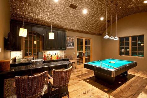 Custom home bar in basement game room with pool table Green Countertops, Quonset Homes, Custom Home Bars, Quonset Hut Homes, Faux Tin Ceiling Tiles, Quonset Hut, Diy Home Bar, Dark Wood Cabinets, Home Bar Designs