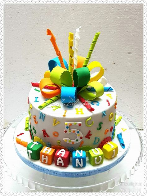 A colorful Alphabet cake for Thanuj for his 5th birthday ! A colorful Alphabet cake for Thanuj for his 5th birthday ! Lil' Delights by Sangeetha Abc Cake Ideas, Alphabet Theme Cake, Abc Theme Cake, Abc 123 Birthday Cake, High Five Birthday Cake, Alphabet Cake Abc, Abc Cake Birthday, Abc Theme Birthday Party, Abc Birthday Cake