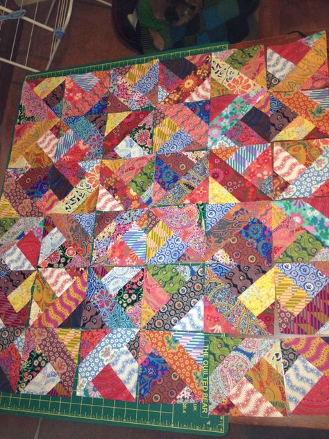 easy jelly roll quilt - really like this quilt. Quick and fun. Maybe the Christmas jelly roll I have sitting in the sewing room. Hidden Wells Quilt, Easy Jelly Roll Quilt, Crumb Quilting, Scrappy Trip Around The World, Trip Around The World Quilt, Around The World Quilt, Jelly Roll Quilt, Charity Quilts, Scrappy Quilt Patterns