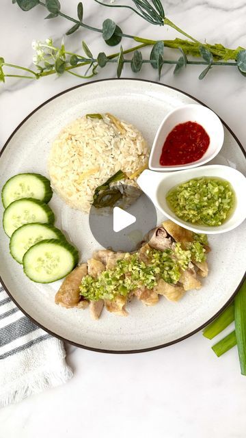 Herman at Home | Food Content Creator on Instagram: "RICE COOKER HAINAN CHICKEN & RICE

Ding dong! Answer this door because you won’t believe how easy it is to make this classic Chinese Hainan chicken and rice dish! The flavors of the garlic, ginger, and scallion seep out and allows the chicken and rice to just soak them all up when cooking. You have to try it because it’s so easy to make! Recipe is below 👇

 Chicken and Rice
- 2 pieces bone-in, skin on chicken thighs
- 1/2 tsp kosher salt
- 1 dash white pepper
- 1 tsp sesame oil
- 2 cups rice uncooked, washed and cleaned
- 1.75 cups low-sodium chicken stock
- 2-inch chunk ginger, cut into thin strips
- 3 cloves garlic, minced
- 2 scallions, trimmed and cut in 1/3

Ginger Scallion Sauce
- 2 large scallions, trimmed (use white and green pa Hainan Chicken Rice, Scallion Sauce, Ginger Scallion Sauce, Hainan Chicken, Easiest Meals, Chicken And Rice Dishes, Chicken Rice Recipes, Rice Cooker Recipes, Rice Chicken