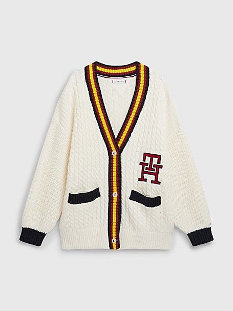 Girl's Kids' TH Monogram Varsity Cardigan  Ancient White  - Tommy Hilfiger girls' sweater. Inspired by our heritage  but designed for tomorrow—our TH Monogram is a modern take on a time-honored icon.60% organic cotton  40% acrylic.Imported. • Machine washable. Monogram Vest, Tommy Hilfiger Shop, Varsity Cardigan, Tommy Hilfiger Store, Tommy Hilfiger Kids, Tommy Hilfiger Girl, Rib Knit Cardigan, Baggy Clothes, High Fashion Outfits