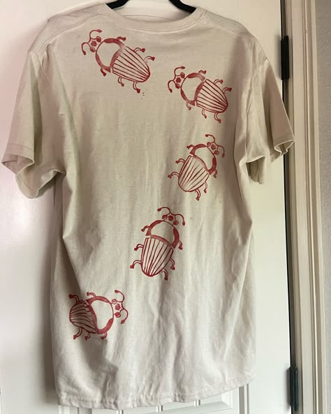 walking beetles shirts are 25% off until midnight tonight! these shirts have been so popular so i decided to put them on sale for today only. do you think i should do walking beetle hoodies or sweatpants next? Block Printed Clothes, Beetle Clothes, Josie Outfits, Beetle Shirt, Ig Outfits, Upcycle Sewing, Future Style, Cold Weather Fashion, Cool Fits