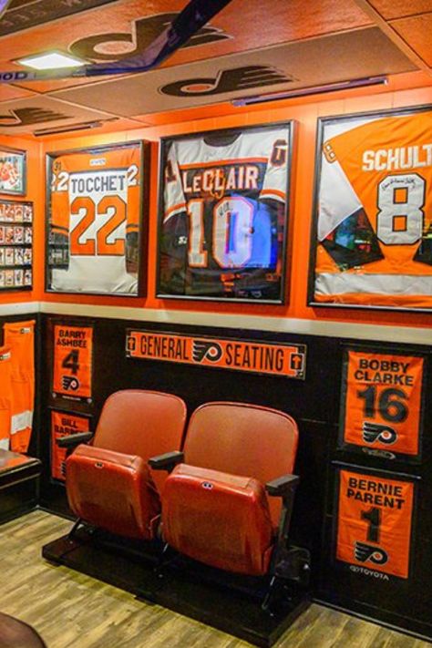 Football Theater Room, Hockey Shadow Box Ideas, Man Cave Basement Sports, Video Game Man Cave, Sports Memorabilia Room, Hockey Man Cave, Golf Man Cave, Sports Cave, Basement Tv Rooms