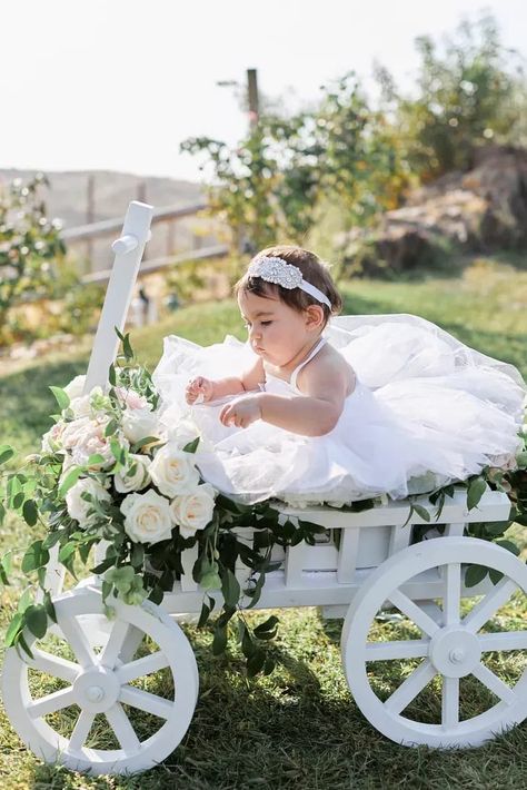 One Year Old Flower Girl, Baby Wagon Wedding, Flower Girl Wagon Ideas Wedding, Baby Flower Girl Wagon, Flower Girl Wagon Ideas, Wedding Wagons For Flower Girl, Baby At Wedding, Wedding With Baby, Flower Girl Wagon