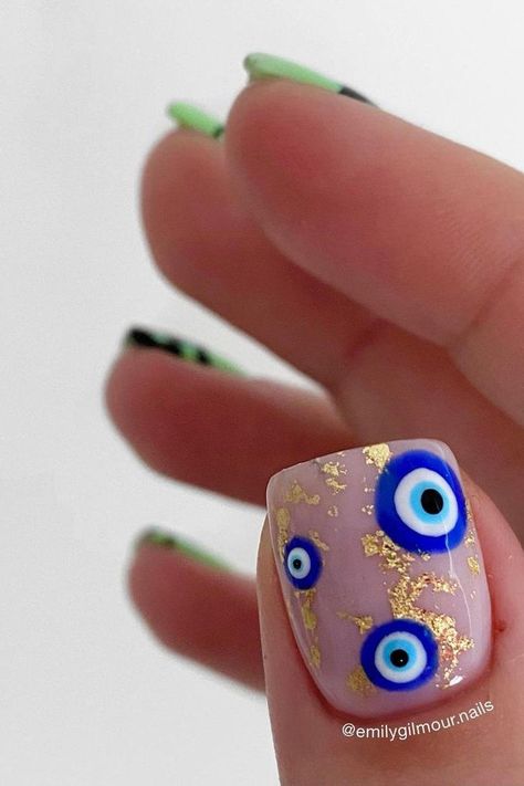 35 Enchanting Evil Eye Nails for a Mysterious and Trendy Manicure Nail With Eye Design, Evil Nails Designs, Evil Eye Nail Designs For Short Nails, Hamsa Nails Evil Eye, Evil Eye Short Nail Designs, Seeing Eye Nails, Lucky Eye Nails, Nail Eye Design, Evil Eye Nail Art Design