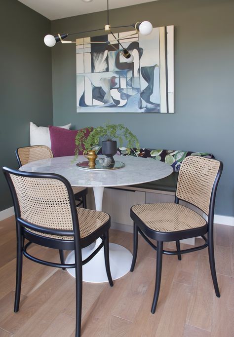 Dining nook in a penthouse condo featuring Hoffman side chairs, a Saarinen Tulip Table and artwork by Laina Terpstra. Designed by The Residency Bureau. Pacific Northwest Interior, Hoffman Chair, Modern Mediterranean Home, Seattle Interior Design, Saarinen Tulip Table, City Penthouse, Modern Penthouse, Tulip Dining Table, Nook Table