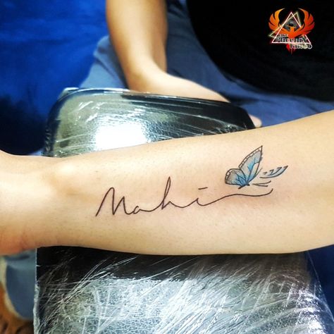 #mahi #withbutterfly #nametattoo #custommade #thinlinetattoo #neatlines #creative #butterfly #tattoo #butterflytattoo #ink #inkedgirls #cleanlines #wristtattoo #handtattoo #colourtattoo #tattooforgirls #tattoomeaning #nameart #besttattooartistchandigarh #toptattoo #artist #chandigarh #phoenixtattoo #dermatologist #dermalizepro Mahi Tattoo Design, Mahi Name Tattoo Design, Mahi Name Tattoo, Mahi Tattoo, Creative Butterfly Tattoo, Name Tattoos For Girls, Name Tattoo Ideas, Creative Butterfly, Body Pain Relief