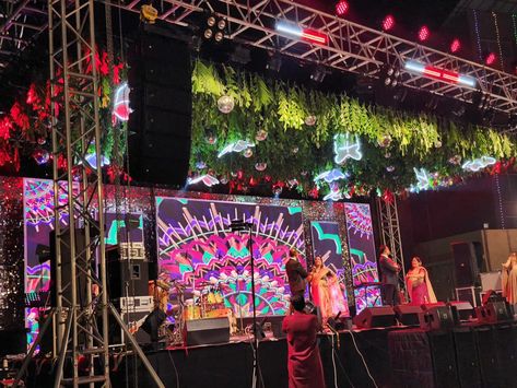 Sangeet box truss stage with LED screen backdrop 💫🦋 . . . . . . . [Sangeet stage with LED screen backdrop, box truss stage, stage ceiling decor, box truss hanging decor, led screen backdrop] Stage With Led Screen, Led Screen Backdrop, Sangeet Stage, Church Stage Design, Church Stage, Sky Is The Limit, Led Screen, Ceiling Decor, Stage Design