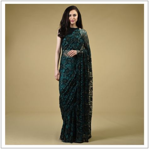 Tantalising Peacock Green French Chantilly Lace Saree Decorated in  Hand Embroidered Intricate Black Beads and Metallic Gold. Chantilly Lace Saree, Threads Instagram, Designer Dress For Men, French Chantilly Lace, Saree Petticoat, Indian Sari Dress, Green French, Lace Saree, Modern Saree