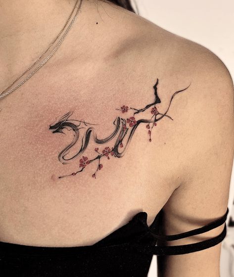 Japanese Minimalist Dragon Tattoo Minimalist Tattoo Japanese Words, Dragon Tattoo Small For Women, Dragon Tattoo With Japanese Writing, Dragon Tattoo For Women On Leg, Japanese Dragon Meaning, Dragon Tattoo For Women Arm Wrap, Chinese Style Tattoo For Women, Chinese Tatoos Ideas, Micro Dragon Tattoo