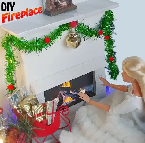 I finally finished my doll's fireplace and I love how it looks! Diy Barbie Fireplace, Diy Barbie Christmas Decorations, Barbie Christmas Decorations, Realistic Fireplace, Miniature Fireplace, Fake Fire, Barbie Dollhouse, Christmas Barbie, Barbie Stuff