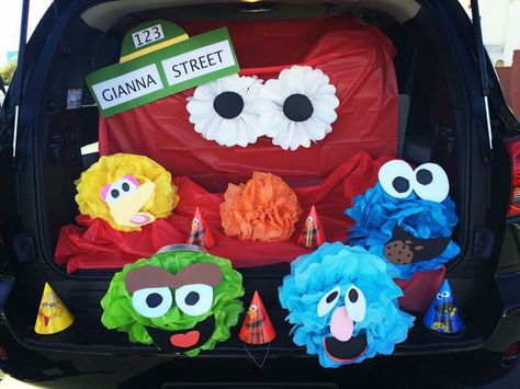 "Gianna Street" Sesame Street Trunk or Treat trunk utilizing tissue paper Pom-Poms! Sesame Street Trunk Or Treat Ideas For Cars, Trunk Or Treat Sesame Street, Sesame Street Trunk Or Treat Ideas, Sesame Street Trunk Or Treat, Trunk Ideas, Trunk Or Treat Ideas, Teal Pumpkin, Fall Festivals, Tissue Paper Pom Poms