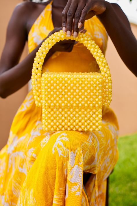 These exquisite Yellow Sugar Beads are carefully handcrafted in Ghana, making them a luxurious and unique addition to any purse collection. Each bead is carefully chosen for its vibrant yellow color and pattern. Measurements including bag handle: Height 9 inches, Length 8 inches, Depth 3 inches Measurements without bag handle: Height 6 inches, Length 6 inches, Depth 3 Inches other colors available Beaded Handbag Patterns, St Louis Zoo, Beads Bag, Sugar Beads, Hand Beaded Bag, Purse Collection, Museum Gift Shop, Museum Gift, Embroidery Bags