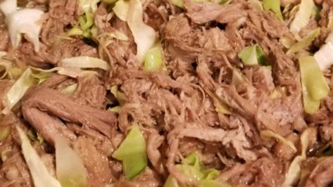 Kalua Pig in a Slow Cooker Recipe - Allrecipes.com Kalua Pork And Cabbage, Pork With Cabbage, Kahlua Pork, Hawaiian Pulled Pork, Kalua Pork, Pork And Cabbage, Hawaiian Dishes, Hawaii Food, Pacific Islands