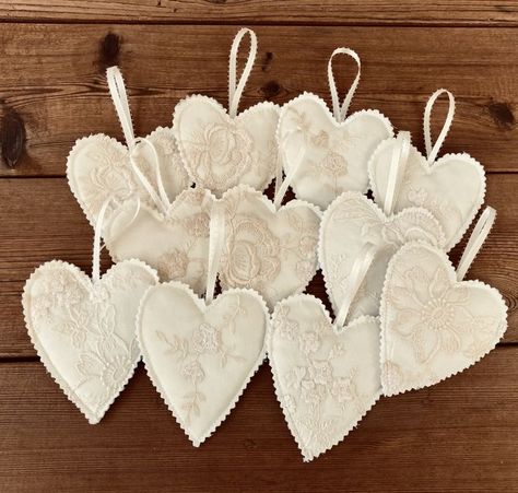 I made zip pouches and then used the left over lace bits to make these heart shaped ornaments Wedding Dress Ornament Diy, Recycle Wedding Dress Ideas Projects, Old Wedding Dress Repurpose, Recycled Wedding Dress Ideas, Dress Ornaments, Wedding Dress Quilt, Repurpose Wedding Dress, Recycle Wedding Dress, Wedding Dress Keepsake