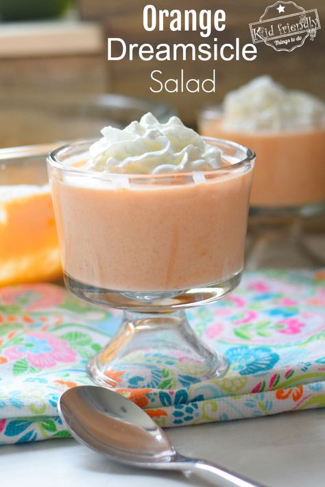 Orange Dreamsicle Jello Salad Recipe - Great Dessert to Feed a Crowd. A classic old school recipe that is perfect for holidays, summer picnics, and backyard get-togethers! #dessertforacrowd #jellodessert #jellosaladrecipe #dessert #creamsicle #jello #salad #mandarin #orange Orange Dreamsicle Jello, Dessert To Feed A Crowd, Creamsicle Jello, Orange Jello Salads, Jello Mold Recipes, Jello Dessert Recipes, Orange Dreamsicle, Jello Desserts, Summer Picnics