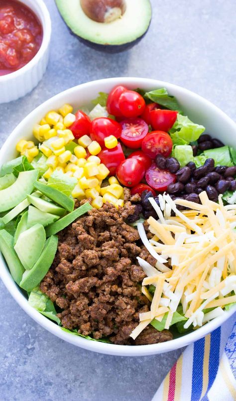 Wondering what to make for dinner? This 20 Minute Healthy Taco Salad recipe will make the whole family happy! It has taco beef, cheese, avocado and salsa dressing! | www.kristineskitchenblog.com Healthy Taco Salad Recipe, Healthy Taco Salad, Taco Salad Recipe Healthy, Awesome Salads, Taco Salad Ingredients, Layered Taco, Healthy Taco Recipes, Taco Salad Recipe, Healthy Taco