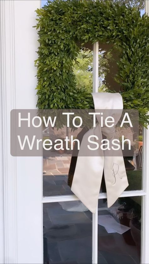 FAQ: How do you tie a wreath sash? 🤔 Today, we’re answering one of our most frequently asked questions. Hit the SAVE button + follow these … | Instagram Boxwood Wreath With Ribbon Front Doors, Simple Ribbon On Wreath, Wreaths On House Exterior, Classic Outside Christmas Decor, Wreaths For Living Room Wall, How To Tie Ribbon On Wreath, Wedding Front Door Decor, Wreath With Ribbons Hanging Down, Door Sash Ideas