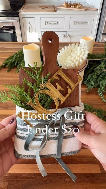 Christmas Housewarming Gift, Gift Baskets With Tea Towels, Kitchen Towel Wrapping Gift Ideas, Serving Board Gift Ideas, Dish Soap Gift Ideas, Tea Towel Gifts, Dish Towel Christmas Gift Ideas, How To Fold Dish Towels Gift Ideas, Board And Brush Ideas