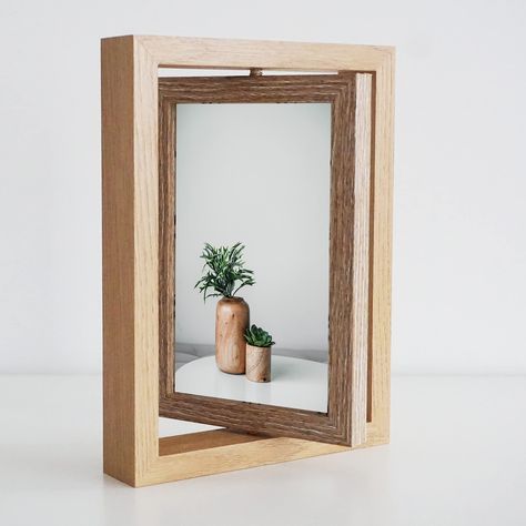 PRICES MAY VARY. This double sided picture frame can hold two 5x7 photos. One on each side. The overall picture frame size is: 7"x9". 360 degree rotation design can display your favourite photos and art work from different angles The picture frame can be display in two positions: vertical or horizontal. Easy Installation: The side slot with clips lets you easily insert the pictures and secure them. This 5x7 picture frame is made of composite wood. It comes with a plexiglass front. Plexiglass has Picture Frame Construction, Double Sided Frame, Cnc Picture Frame, Plexiglass Diy Projects, Wooden Frame Design, Frames Aesthetic, 4h Crafts, Double Sided Picture Frame, Paper Photo Frame