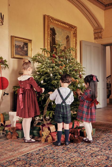 Explore heritage tartans, timeless winter checks, and beautiful Fair Isle knits. Our Christmas collection pays homage to the rich British traditions and iconic styles of centuries past, curating a timeless aesthetic. Don't miss out; shop the collection both in-store and online at pepalondon.com #pepalondon #traditionalchildrenswear #AW23 British Christmas Aesthetic, British Heritage Fashion, Noel Illustration, Highland Fling, British Christmas, Baby Cinderella, Christmas Portrait, British Traditions, Christmas Campaign