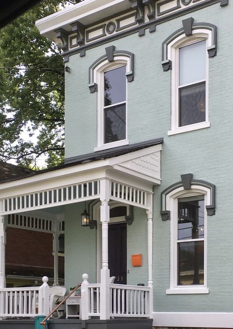 Mint green exterior of two story house with white porch Mint Color House Exterior, Mint Exterior House Colors, Light Teal Exterior House Paint, Pale Green House Exterior, Mint Green House Exterior Color Schemes, Mint House Exterior, Mint Green Exterior House Colors, Mint Green House Exterior, Blue Green House Exterior