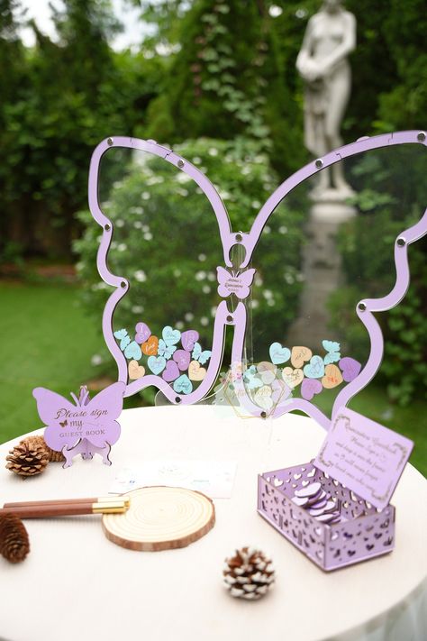 Sweet 16 Purple Butterfly Theme, Quince Ideas Themes, Purple Butterfly Venue Quince, Purple Butterfly Quinceanera Theme Invitation, Sweet 16 Guest Book, Butterfly Guest Book, Quince Invitations Purple Butterfly, Dragonfly Cake, Butterfly Sweet 16