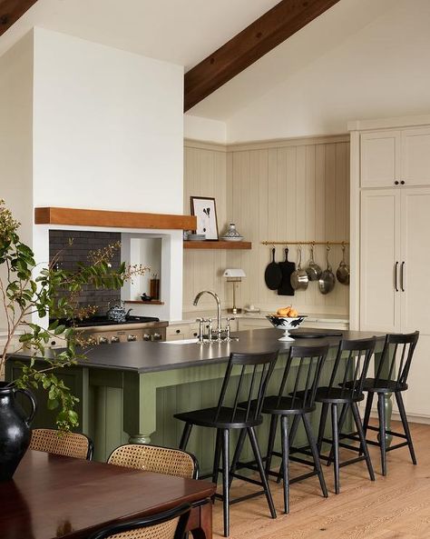 Kitchen features a moss green shiplap center island with black leathered marble countertop with a nickel gooseneck faucet, kitchen island turned legs and black spindle stools. Farmhouse Kitchen Green Island, Kitchen Island Green, Stained Shiplap Kitchen Island, Green Shiplap Island Kitchen, Kitchen Island With Shiplap Sides, Grey Shiplap Island Kitchen, White Cottage Kitchen, Green Kitchen Island, Blue Laundry Rooms