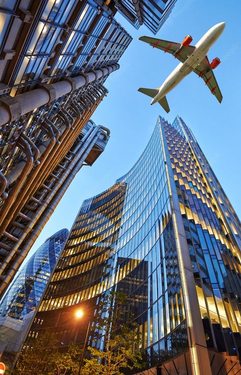 Premium Photo | A jet plane flying over the city Plane Wallpaper, Plane Photography, Plane Flying, Plane Photos, New York Wallpaper, Airplane Wallpaper, Dubai Tour, Airplane Photography, Fotografi Kota