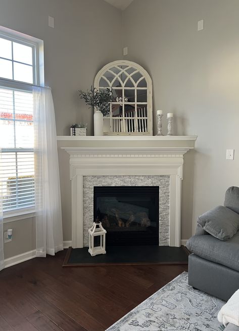 Corner Chimney Ideas, Painted Corner Fireplace, Caddy Corner Fireplace, Deep Corner Fireplace Mantle Decor, Corner Fireplace Mantel Decorating Ideas, Corner Fireplace Mantel Decor, How To Decorate A Corner Fireplace, Deep Corner Fireplace Decor, Fireplace Corner Living Room