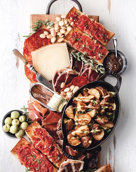 Spanish Tapas Board Recipe - PureWow Tapas Board, Baked Fish Tacos, Fish Tacos With Cabbage, Fancy Appetizers, Fall Appetizers, Spanish Tapas, Baked Fish, Big Meals, Food For A Crowd