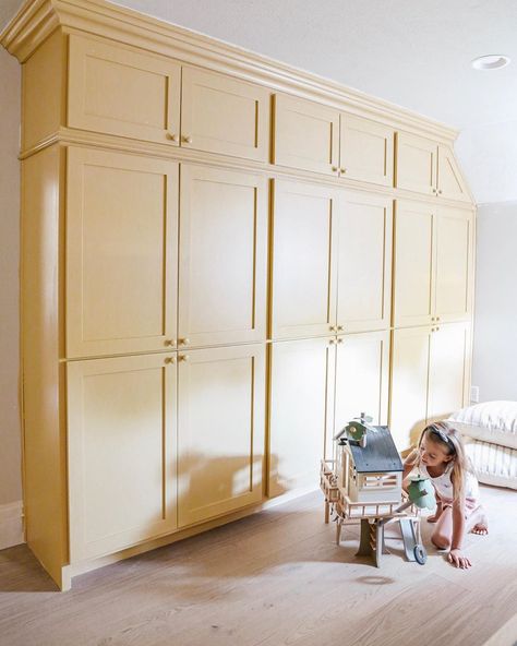 Restrained Gold by Sherwin Williams Cabinets Wallpaper, Playroom Makeover, Yellow Paint Colors, Yellow Cabinets, Side Entrance, Playroom Wallpaper, Painted Cabinets, Striped Walls, Chris Loves Julia